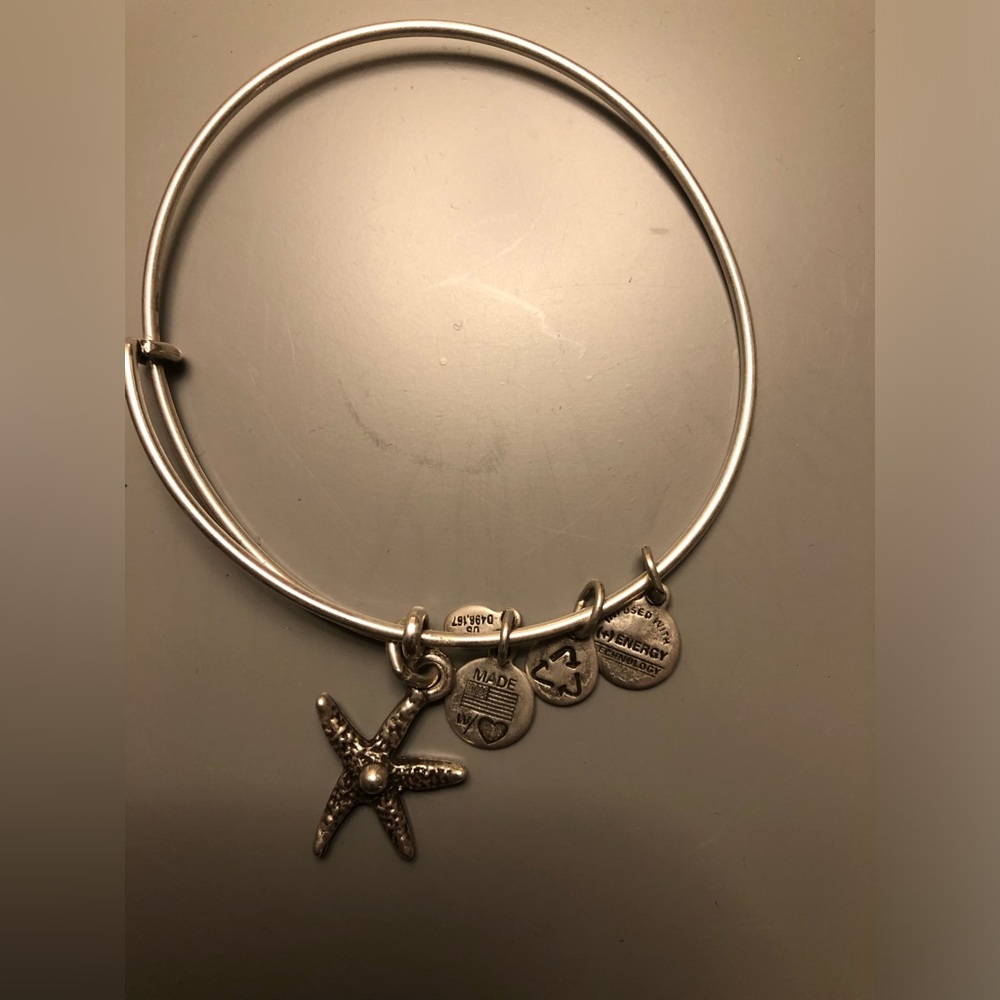 Alex and Ani silver starfish adjustable bangle. Looks great worn in a “stack”